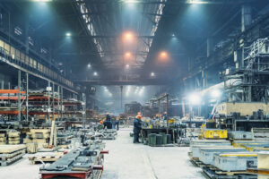 Interior of metalworking factory workshop hangar. Modern industrial enterprise overproduction